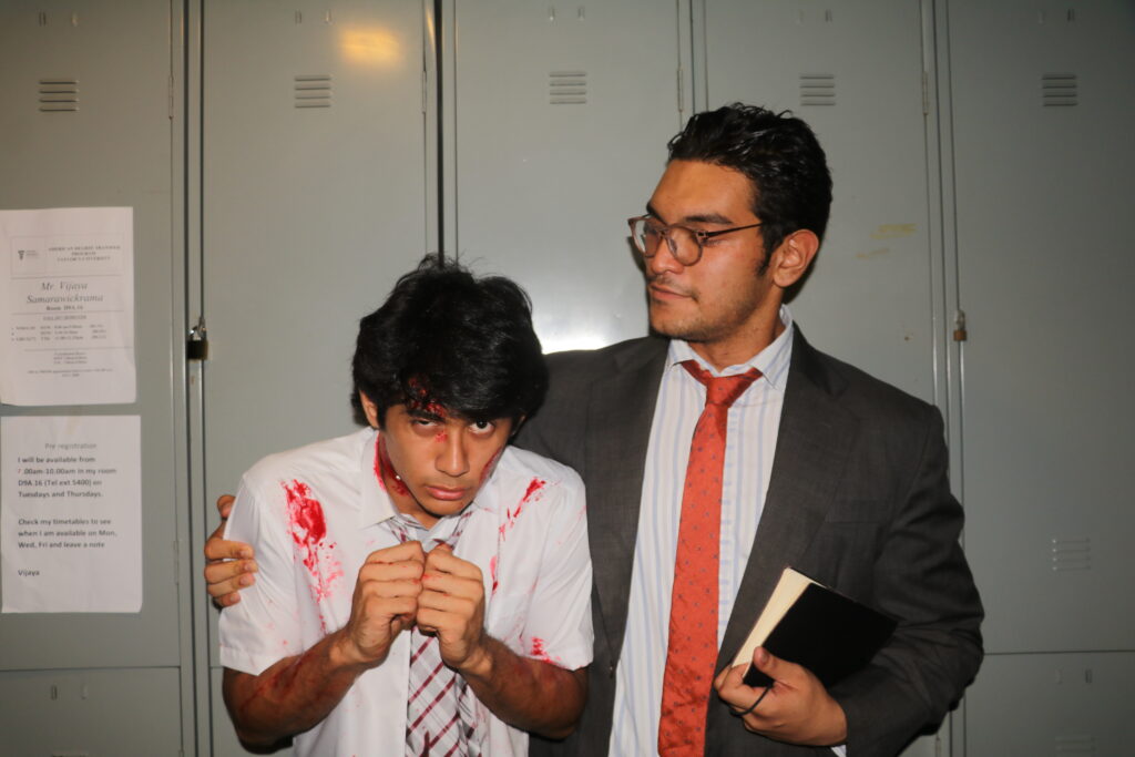 Danniel (Left) as demented student, with Umar as Principal (Right)